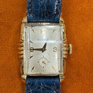 Bulova Gold Dial with Textured Blue Strap